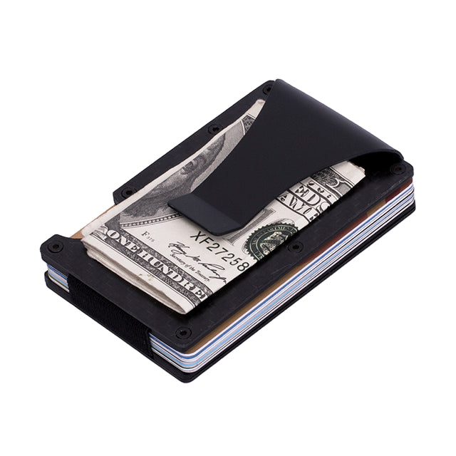 Black metal wallet with money clip holding a stack of dollar bills on a white background